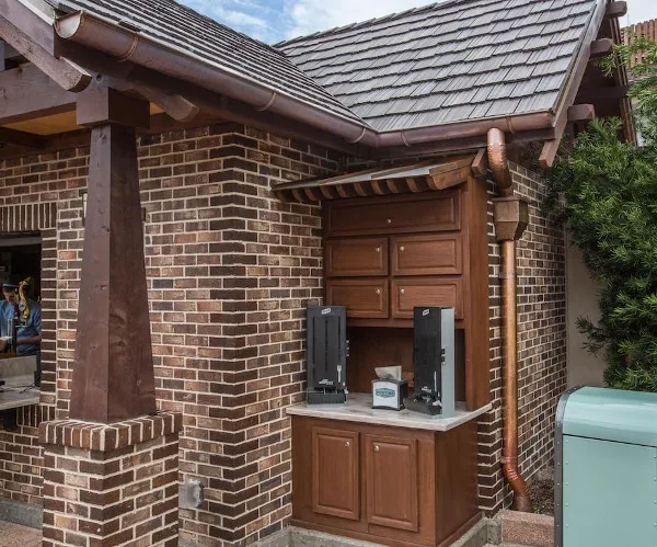 Seamless copper rain gutters on a residential roofline