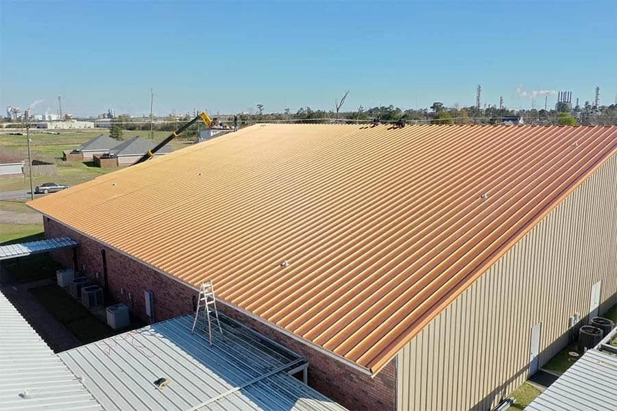 A metal roof over a large commercial building